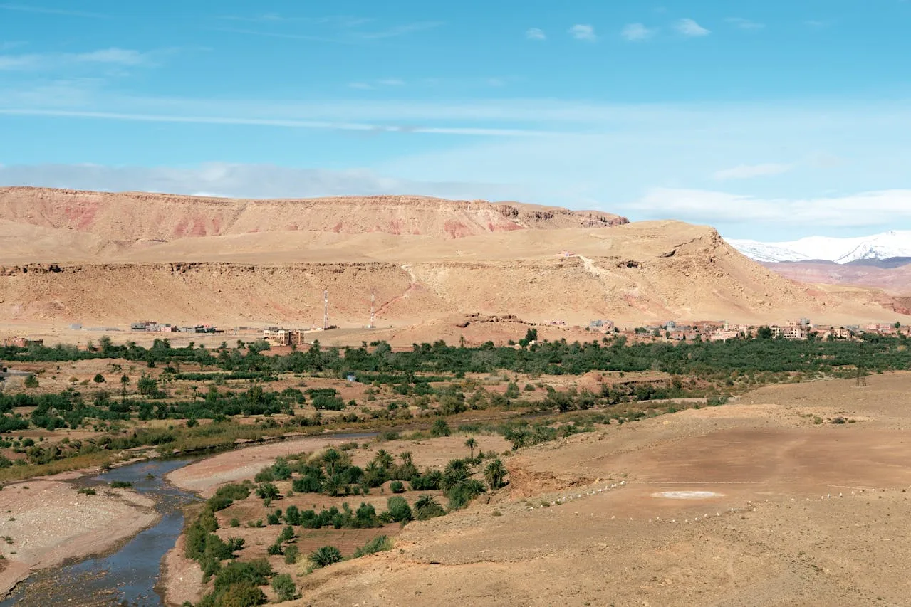 River valley and palm groves below the foothills of the Atlas mountains